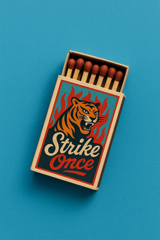 Example output from the Collectible Matchbox Label Mockup ChatGPT prompt: Strike Once