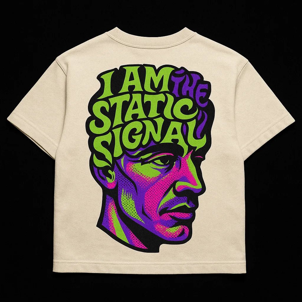 Example output from the Oversized Streetwear T Shirts Back Art ChatGPT prompt: bold graphic T-shirt mockups with screenprint-style back quotes, flat-lay perspective, and expressive pop-style illustrations on cotton fabric. I am the Static Signal.
