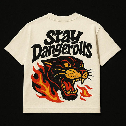 Example output from the Oversized Streetwear T Shirts Back Art ChatGPT prompt: bold graphic T-shirt mockups with screenprint-style back quotes, flat-lay perspective, and expressive pop-style illustrations on cotton fabric. Stay Dangerous.