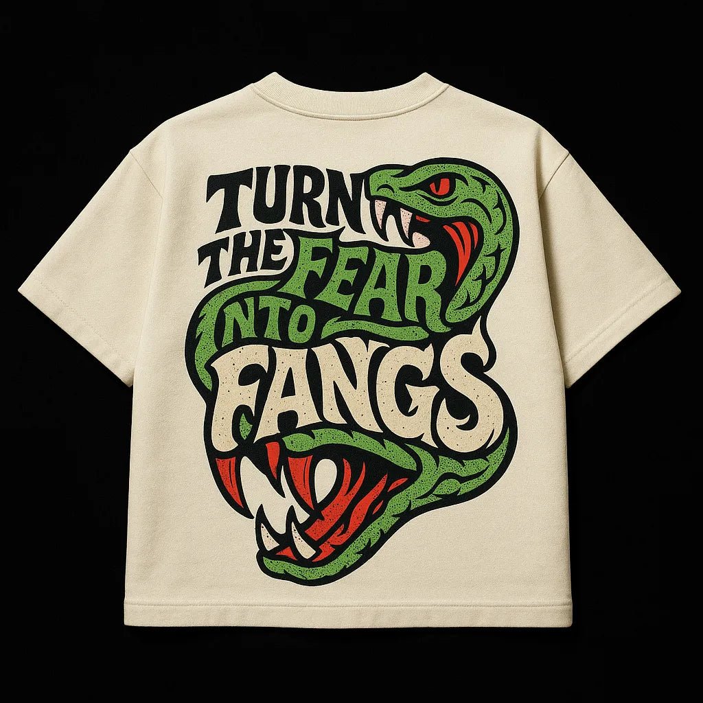 Example output from the Oversized Streetwear T Shirts Back Art ChatGPT prompt: bold graphic T-shirt mockups with screenprint-style back quotes, flat-lay perspective, and expressive pop-style illustrations on cotton fabric. Turn the Fear into Fangs.
