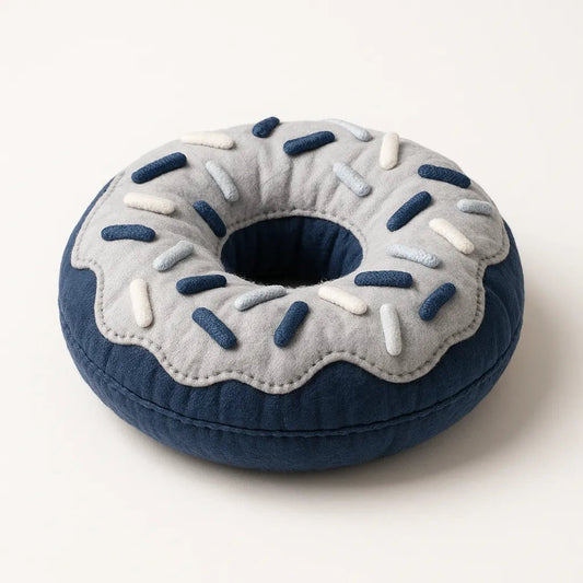 Example output from the Photorealistic 3D Plush Product Render prompt: Donuts.