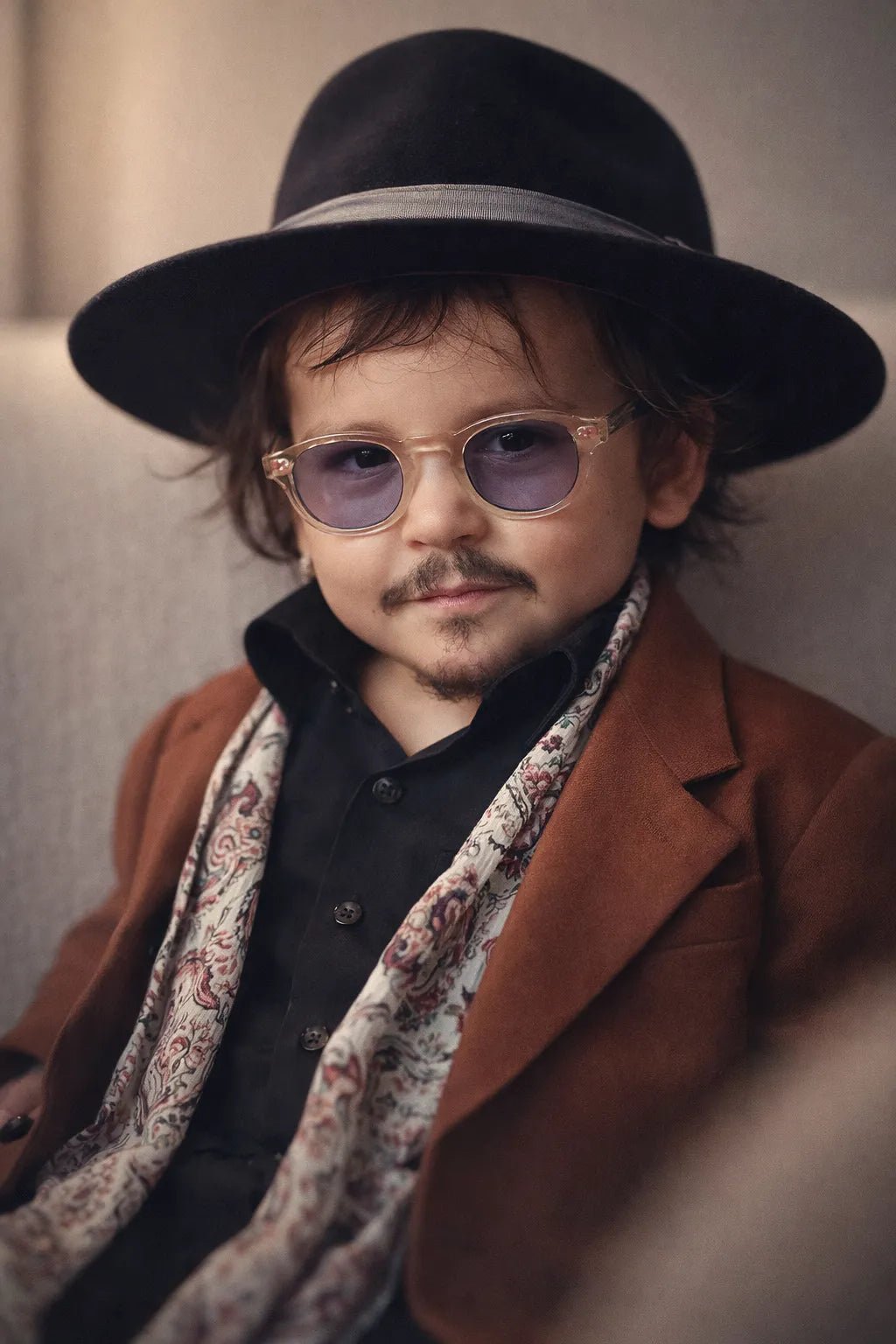 Luxury editorial baby-style portrait created from real photo, featuring high-fashion outfits, cinematic lighting, and premium studio aesthetics: Johnny