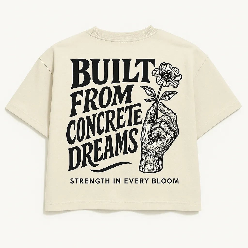 Example output from the Bold Lettered Tshirt Back Art ChatGPT prompt: oversized t-shirt graphics with bold phrases, featuring vintage-style lettering. Build from concrete dreams.