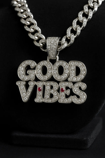 Example output from the Custom Iced Diamond & Ruby Pendant Shot ChatGPT prompt: Good Vibes.