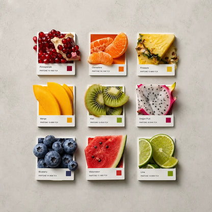 Example output from the Editorial Pantone Fragment Grids ChatGPT prompt: a Pantone-style color grid themed 'Fruits', with swatches made from real fruit fragments (pomegranate, mango, kiwi, watermelon and more), printed color chips and Swiss-style labels on a neutral background.