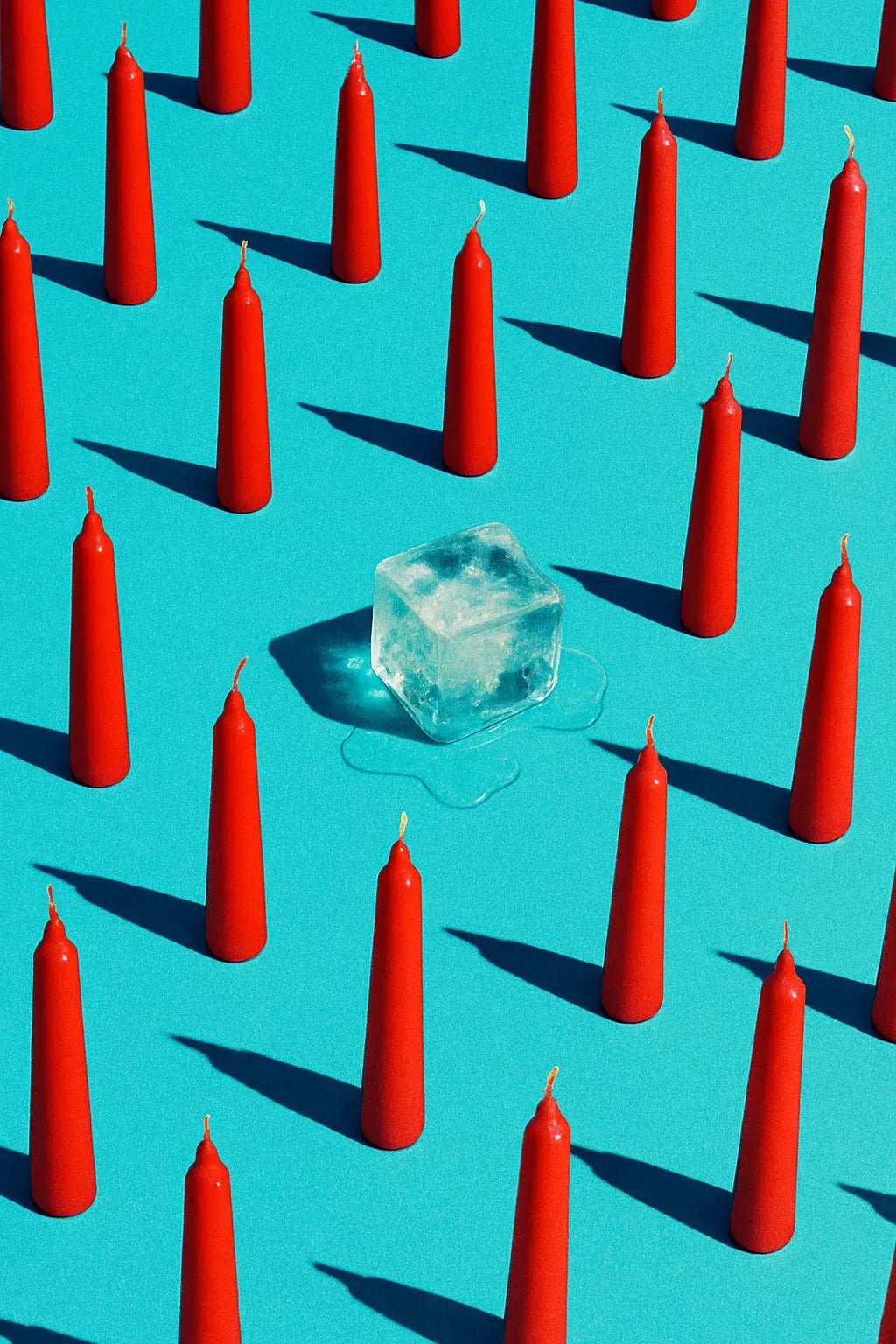 Example output from the Infinite Object Grids With A Twist ChatGPT prompt: visually symbolic object grids disrupted by a single odd element, featuring cropped compositions, sharp lighting, and emotional contrast for viral visuals. Ice.