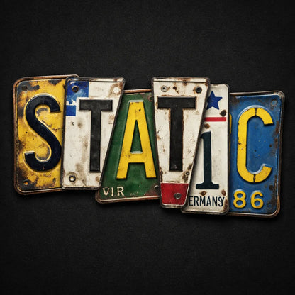 Typography collage made from vintage license plate fragments forming bold word on a dark background: Static