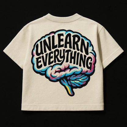 Example output from the Oversized Streetwear T Shirts Back Art ChatGPT prompt: bold graphic T-shirt mockups with screenprint-style back quotes, flat-lay perspective, and expressive pop-style illustrations on cotton fabric. Unlearn Everything.