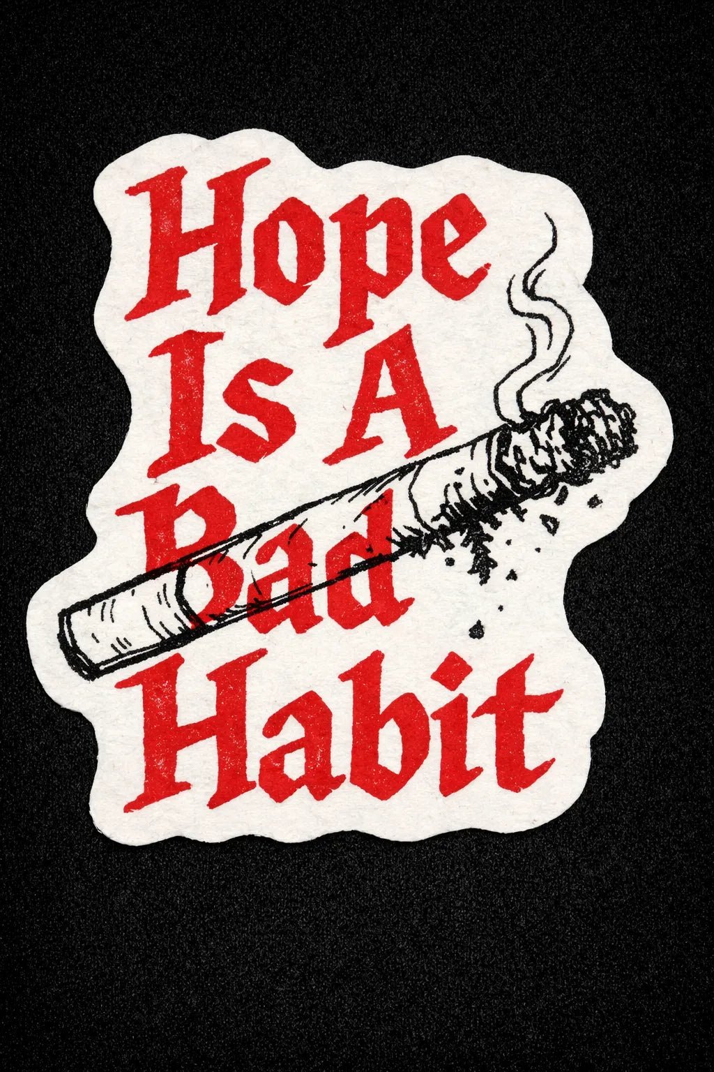 Example output from the Raw Gothic Quote Sticker ChatGPT prompt: Hope is a Bad Habit