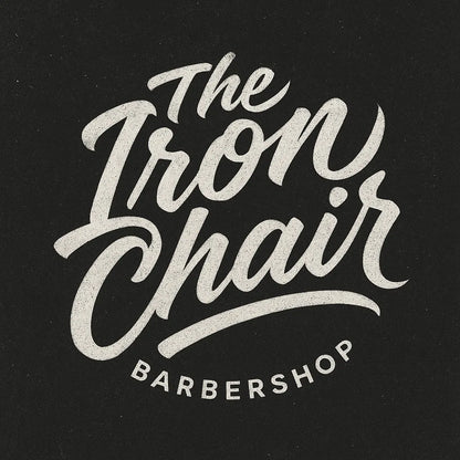 Example output from the White Bold Brush Script Logos ChatGPT prompt: The Iron Chair.
